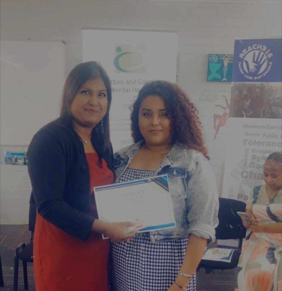 Certificate presentation at a mental health workshop