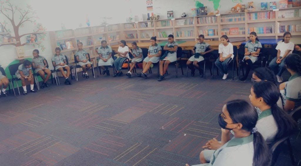Learners in a group circle session