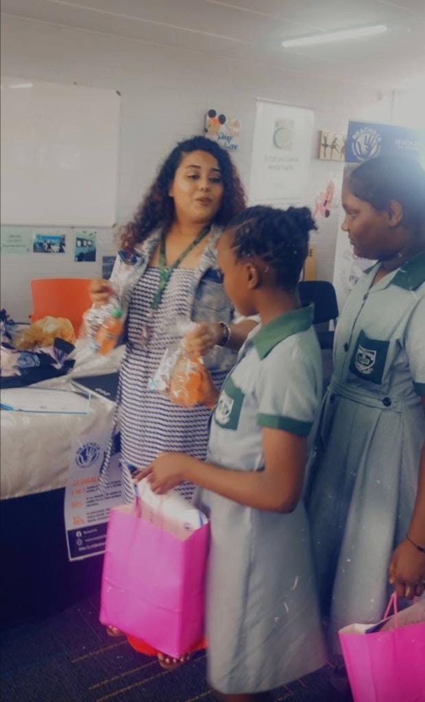 Handing out food to school learners